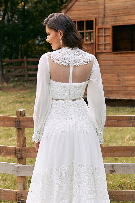 Robe de mariée bohème ivoire à manches longues en dentelle