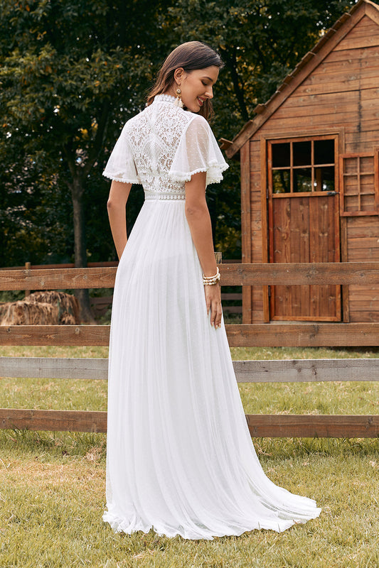 Robe de mariée bohème vintage en mousseline ivoire avec dentelle