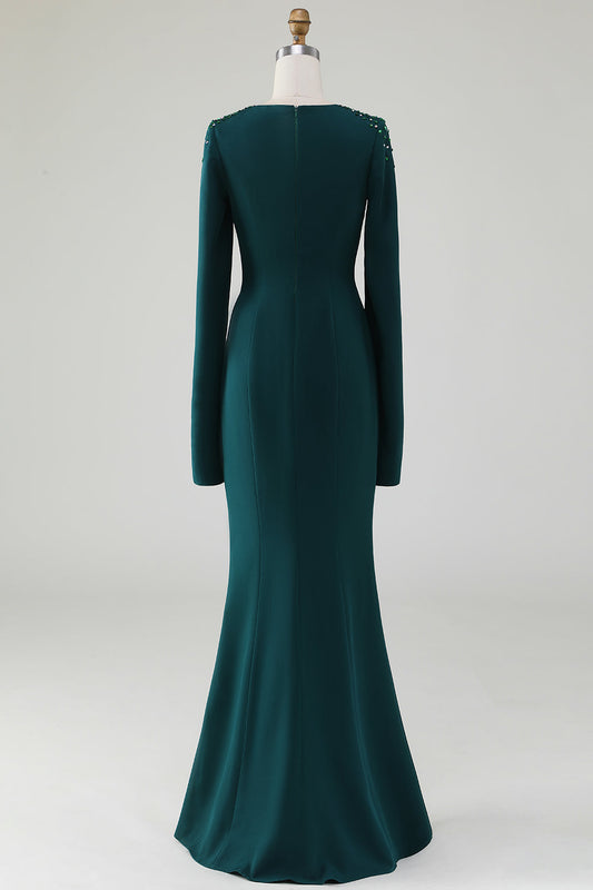 Robe longue sirène vert foncé à encolure ronde et manches cape ornées de perles