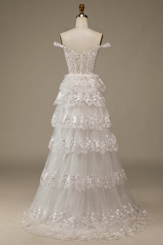 Robe de mariée bustier à volants en dentelle blanche pailletée avec fente