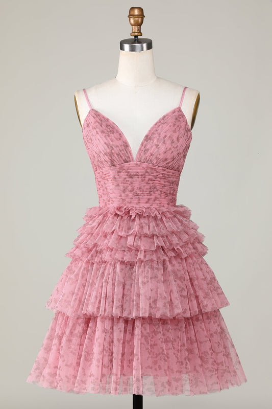 Jolie robe de bal rose poudré évasée à fines bretelles et volants