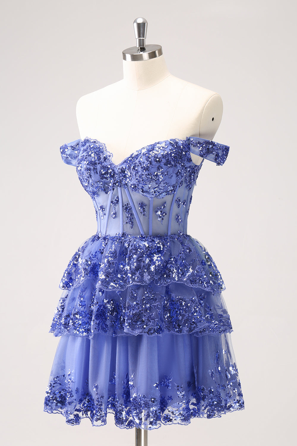 Robe de bal bleu foncé scintillante coupe trapèze avec corsage dénudé aux épaules et volants
