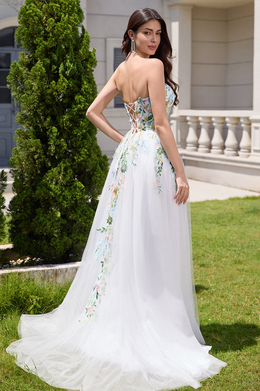 Robe de mariée bustier blanche évasée en tulle avec longue fente et fleurs 3D