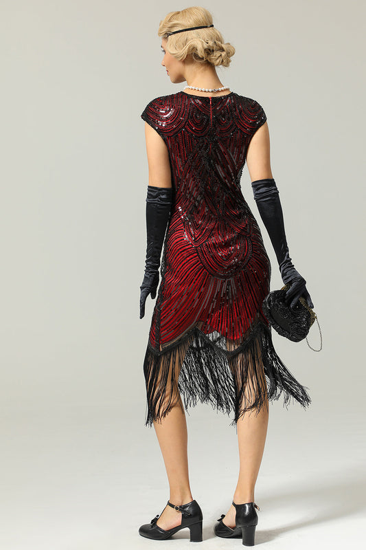Robe Gatsby bordeaux des années 20 à paillettes et franges