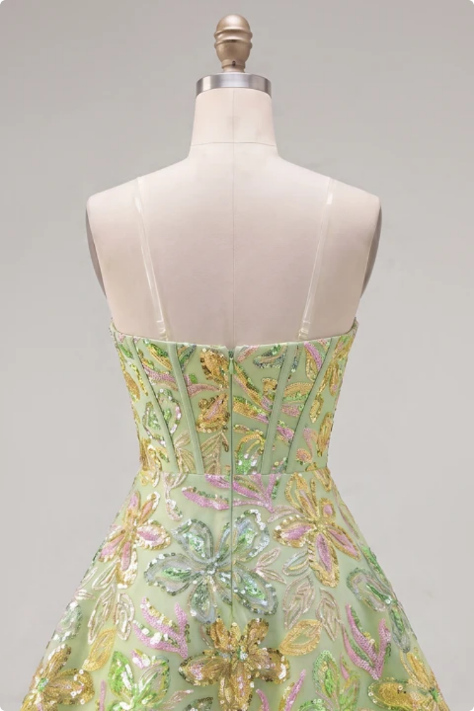 Robe courte de cocktail trapèze verte à corset et paillettes