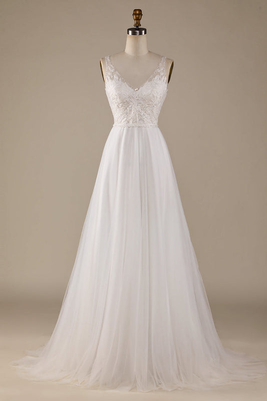 Robe de mariée en tulle ivoire, décolleté en V, traîne balayage et dentelle