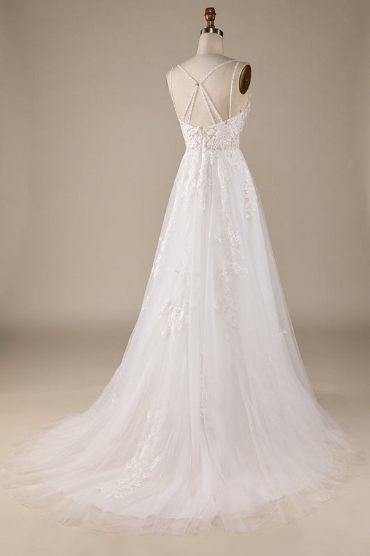 Robe de mariée ivoire trapèze en tulle avec bretelles croisées dans le dos