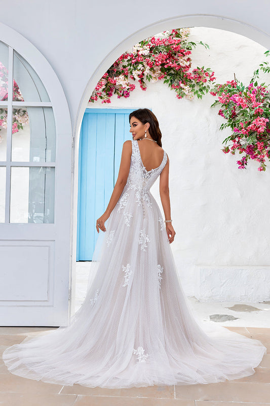 Robe de mariée ligne A en tulle abricot avec traîne et dentelle